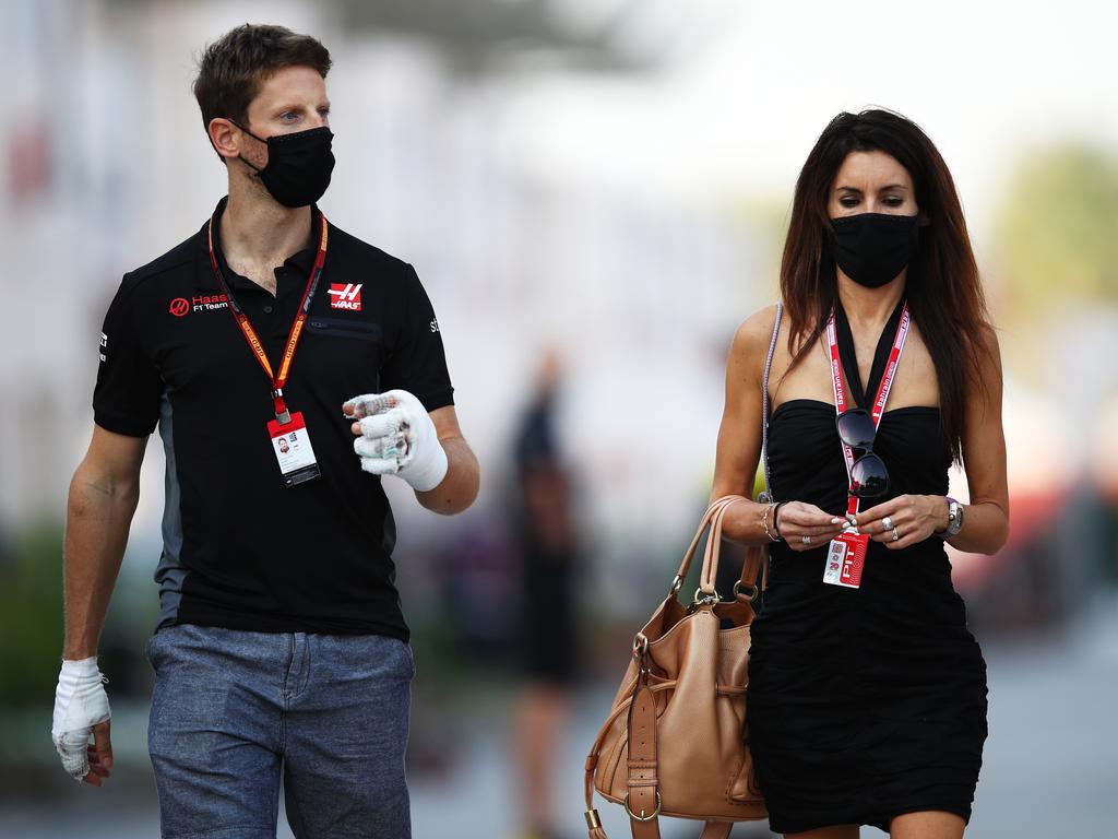 Romain Grosjean of France and Haas F1 walks in the Paddock with his wife Marion before final practice ahead of the F1 Grand Prix.