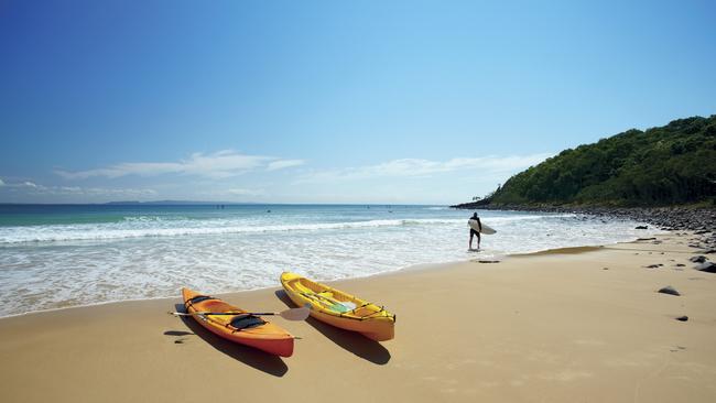 Canoes on Noosa Beach.