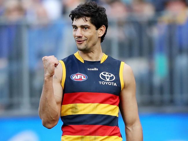 PERTH, AUSTRALIA - AUGUST 07: Shane McAdam of the Crows celebrates after scoring a goal during the 2022 AFL Round 21 match between the West Coast Eagles and the Adelaide Crows at Optus Stadium on August 7, 2022 in Perth, Australia. (Photo by Will Russell/AFL Photos via Getty Images)