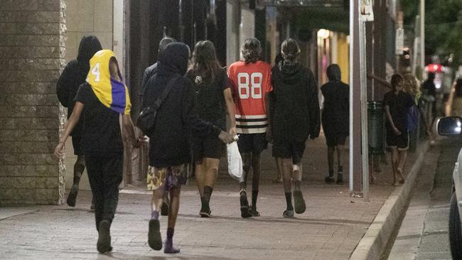 Young children roaming the streets of Alice Springs just before midnight on Thursday. Picture: Liam Mendes/The Australian