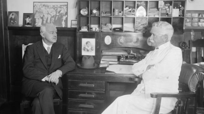 Macpherson Robertson (right) welcomes guest Professor Moody to his Fitzroy chocolate factory in the early 1900s. Picture: State Library of Victoria