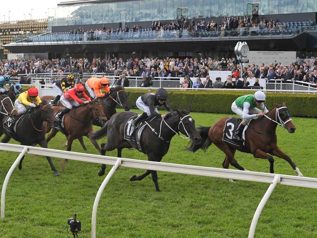 Rawiller rides Tasmanian The Inevitable to victory the Silver Eagle on Champion Stakes Day at Royal Randwick.