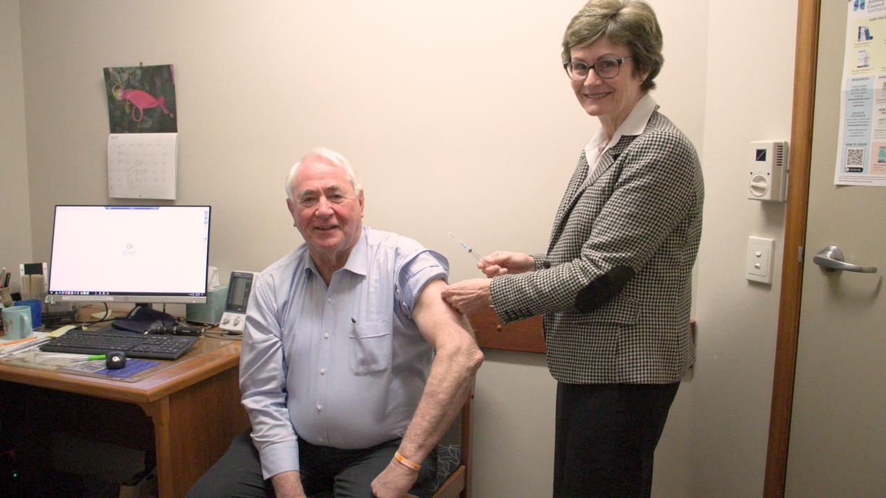 Toowoomba Mayor Paul Antonio receives his first COVID-19 vaccination from Dr Lynne King.