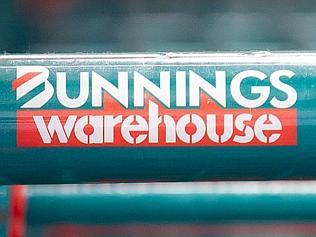 The logo of Wesfarmers Ltd.'s Bunnings Warehouse is displayed on shopping trolleys at a store in Sydney, Australia, on Thursd...