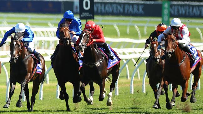 Passive Aggressive (right) storms home to win the Challenge Stakes.