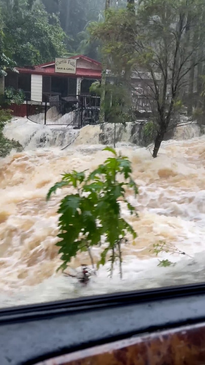 Motorists in shock as road turns into waterfall in cyclone aftermath