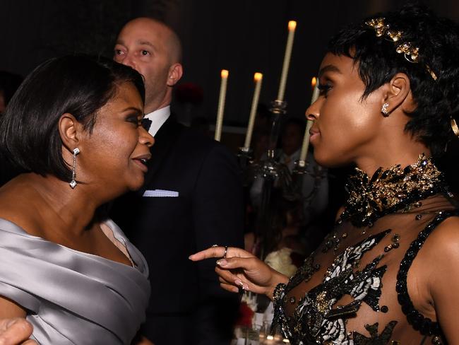 Hidden Figures stars Octavia Spencer and Janelle Monae share a moment at a post-Oscars bash. Picture: AFP/Angela Weiss