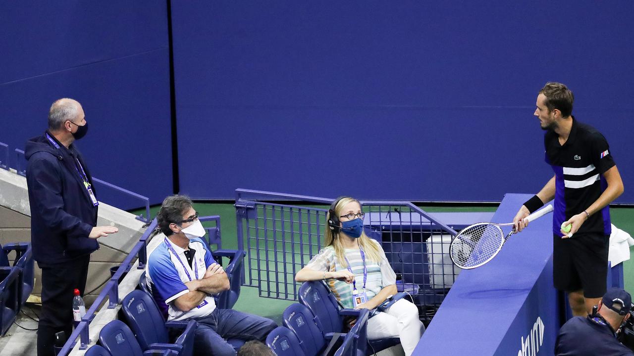 Daniil Medvedev (R) of Russia argues a call with US Open umpire supervisor Wayne McKewen (L) in a semi-final meltdown.