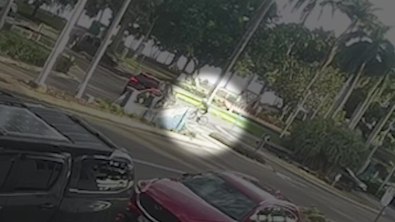 CCTV captures moment bicycle, car collide