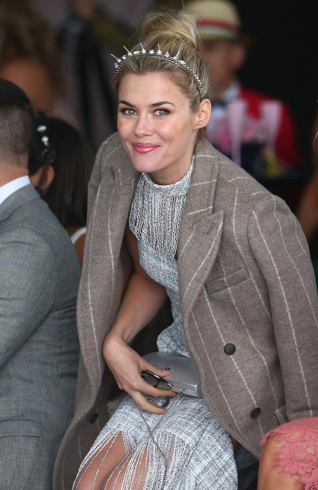 Rachael Taylor is all smiles as she dons a jacket at the David Jones Marquee. Picture: Scott Barbour, Getty Images.