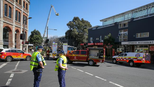 Fire Crews and Police on the scene of the fire last month. Picture: NCA Newswire/ Gaye Gerard