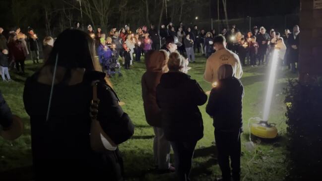 Candlelit vigil held for girl, four, who was mauled to death by pet dog