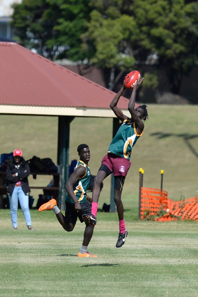 Sibit Mach takes a mark for Centenary Heights State High School against Concordia in AFL Queensland Schools Cup Darling Downs round at Captain Cook ovals, Friday, April 27, 2018. Picture: Kevin Farmer