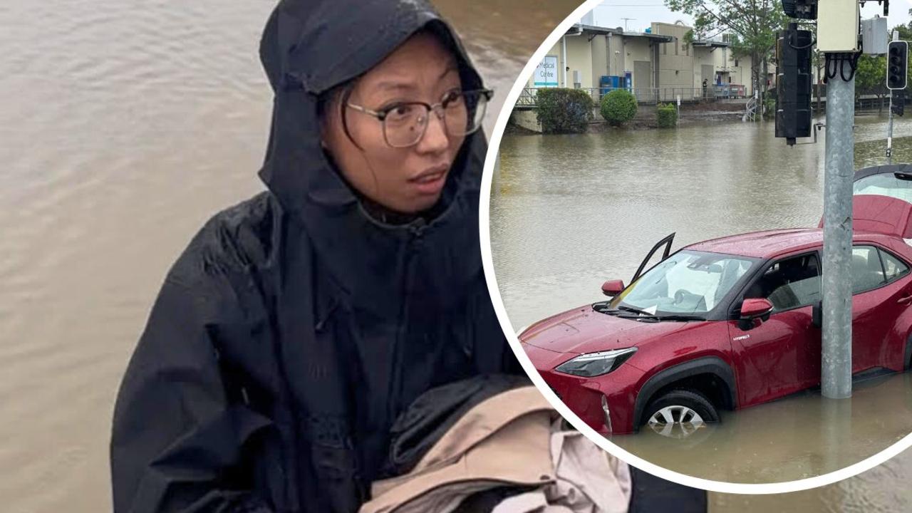 Uber driver’s lucky escape after being trapped in Brisbane floods