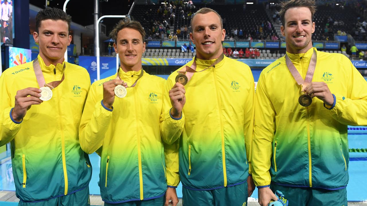 (l-r) Jack Cartwright, Cameron McEvoy, Kyle Chalmers and James Magnussen after winning gold in the 4x100m relay.