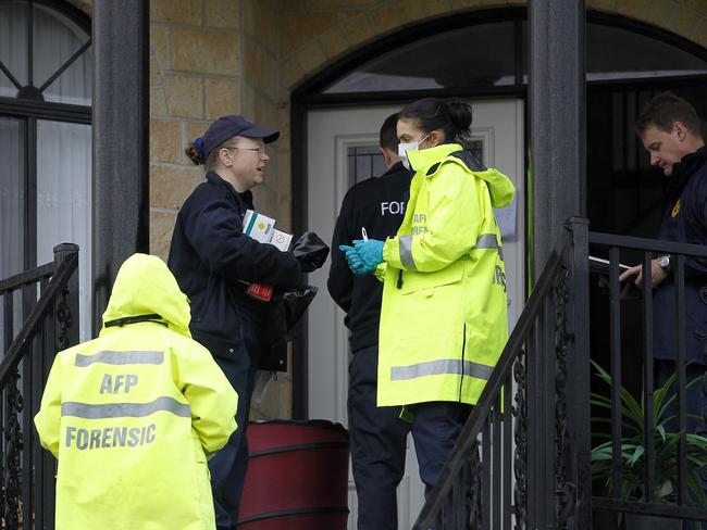 Forensic officers at the teenager’s home in Melbourne’s northern suburbs.