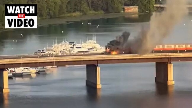 Commuters leap from burning train