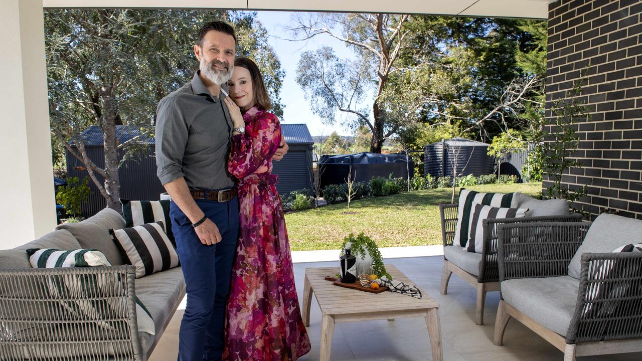 Sharyn and Jack Piromanski in their outdoor alfresco area at their Mylor home they have on the market. Picture: Mark Brake.