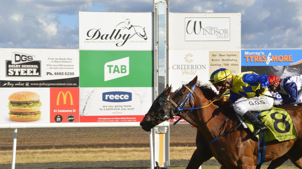 Tapa and Gary Geran (number eight) edge out Allround Glory in today's Lightning Handicap at Bunya Park. Picture: Glen McCullough