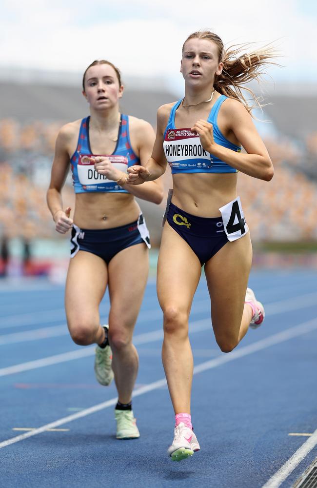 Zoe Honeybrook of ACT leads Phoebe Doran of New South Wales in the Girls' U18 800m. Photo by Cameron Spencer/Getty Images