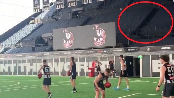 Collingwood AFL players training on what was a netball facility.