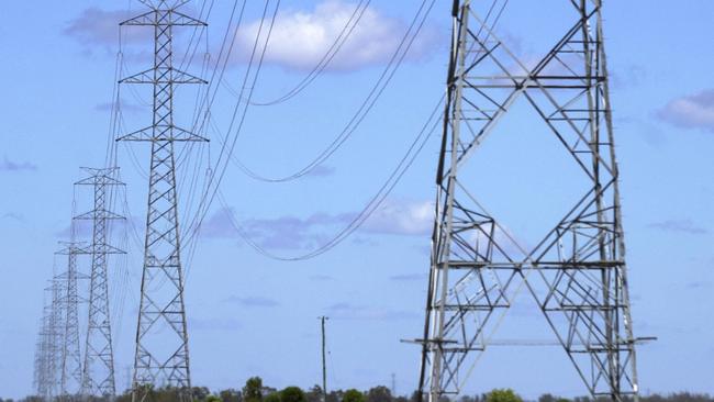 16 Mar 2005: Interconnector crossing the Warrego Highway running from Tarong Power Station through to NSW. picDavid/Martinelli high voltage powerlines electricity qld power pylon pylons silhouette