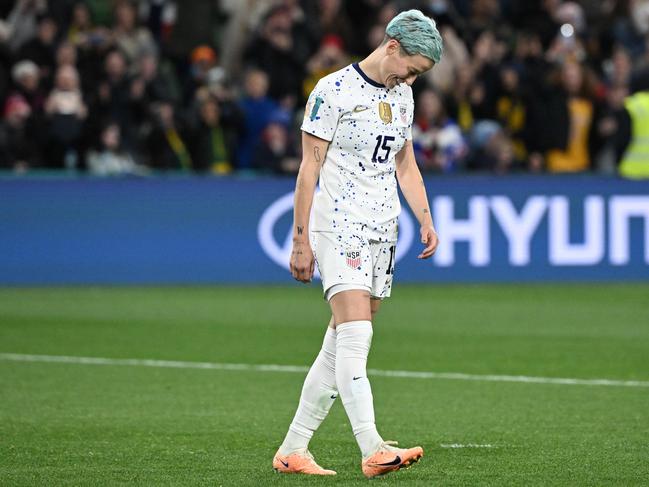 Megan Rapinoe reacts after failing to score in the penalty shootout. (Photo by WILLIAM WEST / AFP)