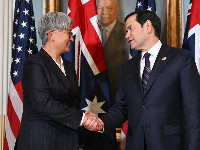 US Secretary of State Marco Rubio and Australian Foreign Minister Penny Wong shake hands as they meet at the State Department in Washington, DC, on January 21, 2025. (Photo by ANDREW CABALLERO-REYNOLDS / AFP)