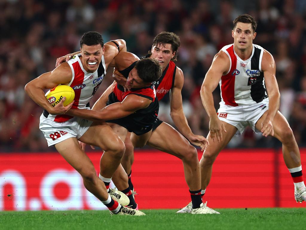 Marcus Windhager being tackled by Archie Perkins. The Saint will miss Gather Round after being suspended for a bump on Sam Durham. Picture: Quinn Rooney/Getty Images.