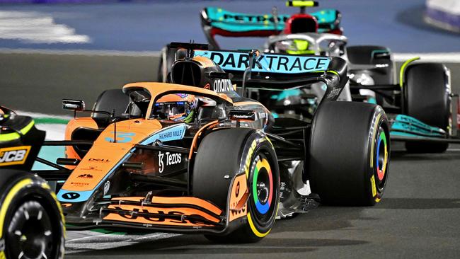 McLaren's Australian driver Daniel Ricciardo (C) drives during the 2022 Saudi Arabia Formula One Grand Prix