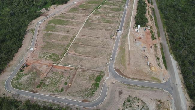 Aerial photo of a housing subdivision in Lockhart River, a Far North Queensland remote community on the Cape York Peninsula. Lockhart River mayor Wayne Butcher said the 25-lot subdivision was built in 2023 with $7.2m of funding (average $340K per block). Picture: Supplied/Facebook