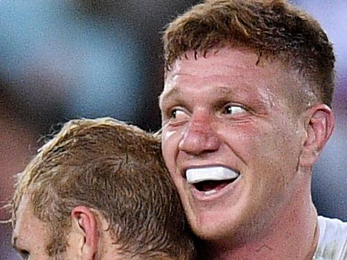 Dylan Napa (right) and Aiden Tolman of the Bulldogs celebrate their win over the Rabbitohs in the Round 22 NRL match between the South Sydney Rabbitohs and the Canterbury Bulldogs at ANZ Stadium in Sydney, Saturday, August 17, 2019. (AAP Image/Dan Himbrechts) NO ARCHIVING, EDITORIAL USE ONLY