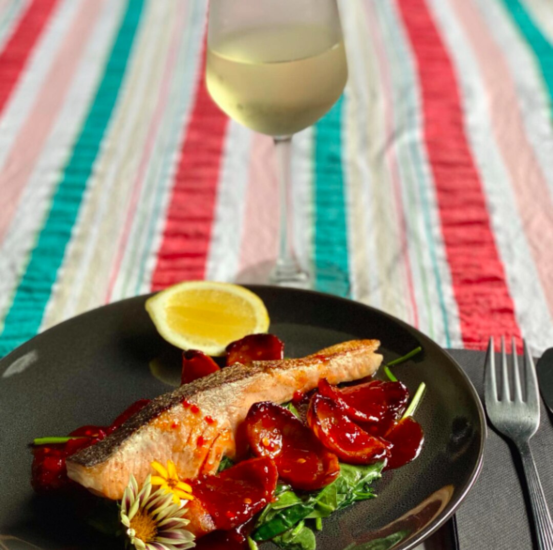 Hervey Bay's Sea Breeze Cafe serves a crispy skin salmon with chorizo and chilli jam. Is this your type of go-to brunch? Picture: Facebook/Sea Breeze Cafe Hervey Bay