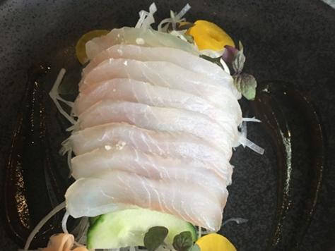 Red emperor sashimi with house-pickled ginger, baby shiso, daikon shreds, cucumber, turmeric-pickled daikon and a sweet miso paste with ginger syrup. At La Lune Wine Co, South Brisbane.