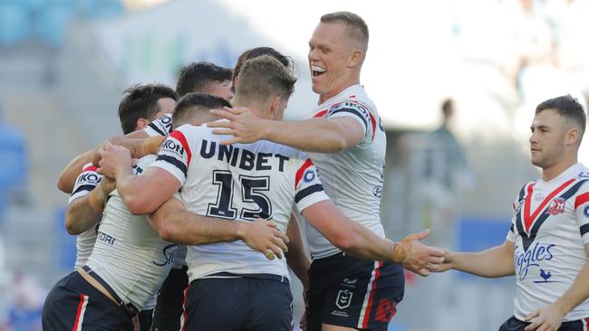 GOLD COAST, AUSTRALIA - JULY 22: James Tedesco of Roosters celebrates scoring a try with team mates during the round 21 NRL match between Gold Coast Titans and Sydney Roosters at Cbus Super Stadium on July 22, 2023 in Gold Coast, Australia. (Photo by Getty Images/Getty Images)