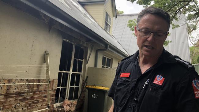 NSW Fire and Rescue's fire and research investigator Michael Forbes at the fire-ravaged house at Whitehaven Rd, Northmead, a day after the blaze.