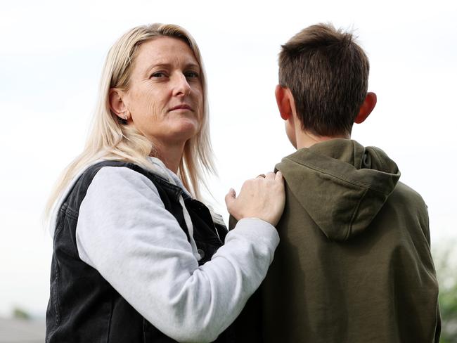 Belinda De Gioia with her 14-year-old son, who was assaulted at school. Picture: Tim Hunter