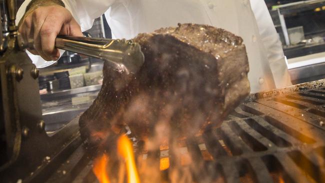 Dany Karam cooking Sydney's most expensive steak, for $600 per kilogram at Black Restaurant, The Star. Picture: Dylan Robinson