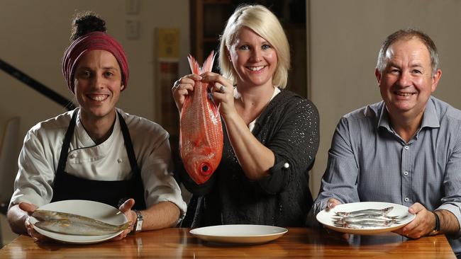 Topiary chef Kane Pollard, Jane Harman from the Kangaroo Island Stall at the Adelaide Central Market and food writer Simon Wilkinson prepare for the fish taste test. Picture: Calum Robertson