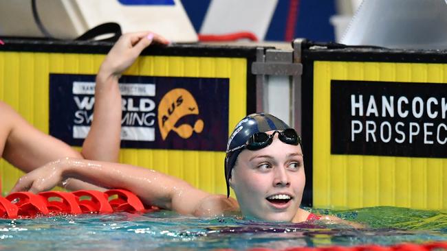 Minna Atherton wins the 100m backstroke final at the nationals.(AAP Image/Darren England)