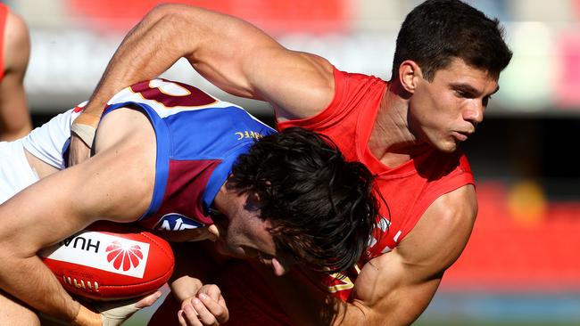 Jaeger O'Meara lands a tackle during a rare NEAFL appearance this year. Picture: Adam Head