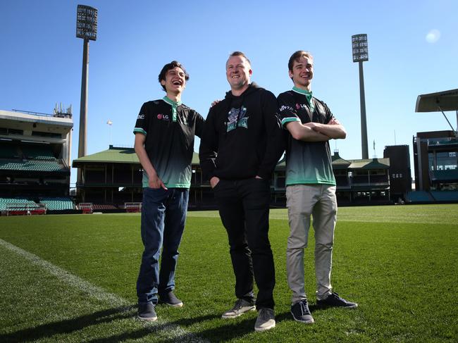 11/07/2019  E-sports investor Dave Harris, of investment firm Guinevere Capital with team members (L-R) Brandon 'BioPanther' Alexander (20) and Nathan 'Rippii' Mott (23). Harris is selling his SCG based esports teams including the Dire Wolves and Sydney Drop Bears for several million dollars. Jane Dempster/The Australian.