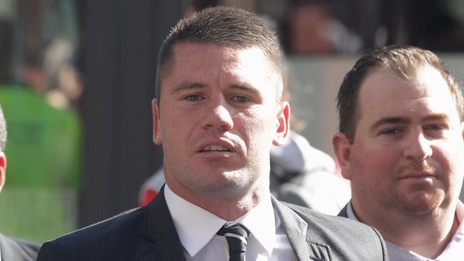 Pic of Roosters player Shaun Kenny-Dowall entering Downing center courts today. Shaun Kenny-Dowall charged with repeatedly assaulting former partner Jessica Peris. He faces 10 charges including six counts of common assault, one count of assault occasioning bodily harm and stalking/intimidating. He is