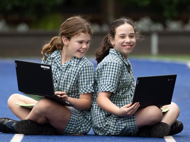 MELBOURNE AUSTRALIA - DECEMBER 14TH 2023 : Literacy captains for 2024, Ava Holdsworth and Chloe Carlyon, both celebrate great results for their NAPLAN this year, at St Finbars Primary School, Brighton East.PICTURE : Nicki Connolly