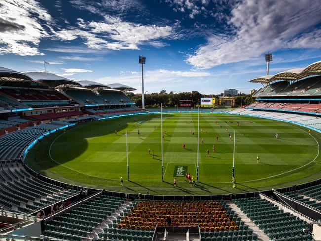 ADELAIDE, AUSTRALIA - MARCH 21: (EDITORS NOTE: Image was altered with digital filters.) A general view of play during the round 1 AFL match between the Adelaide Crows and the Sydney Swans at Adelaide Oval on March 21, 2020 in Adelaide, Australia. (Photo by Daniel Kalisz/Getty Images) *** BESTPIX ***