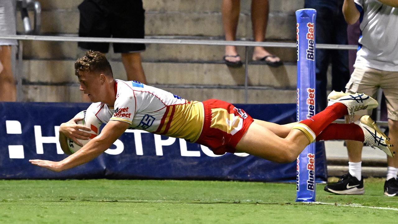 Jack Bostock scores against the Titans in the final trial. Picture: Bradley Kanaris/Getty Images