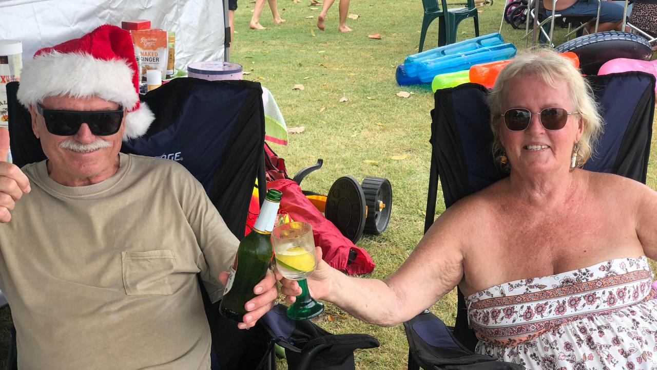 Ian and Pat Room enjoy Christmas celebrations at Cotton Tree Park. Picture: Laura Pettigrew.