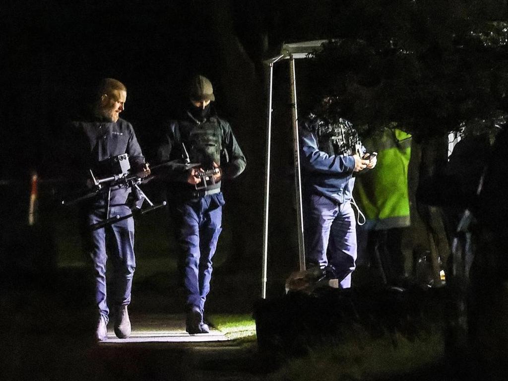 Police at the scene of the siege in Cranbourne.