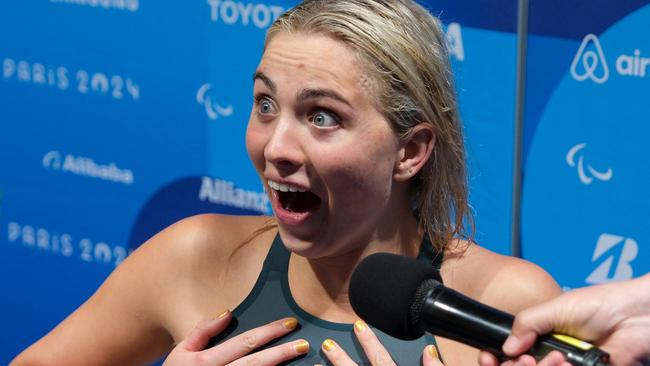 Australia's golden girl of the pool, Alexa Leary, wins the Paris Paralympic 100m S9 100m freestyle in a world record time at the La Defense Arena watched by her family and friends. Photo: Jacquelin Magnay