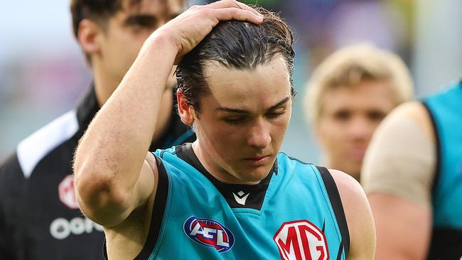 ADELAIDE, AUSTRALIA - JUNE 22: Connor Rozee of the Power leads his team off after the big loss during the 2024 AFL Round 15 match between the Port Adelaide Power and the Brisbane Lions at Adelaide Oval on June 22, 2024 in Adelaide, Australia. (Photo by Sarah Reed/AFL Photos via Getty Images)